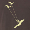 Oiseau en plein vol.